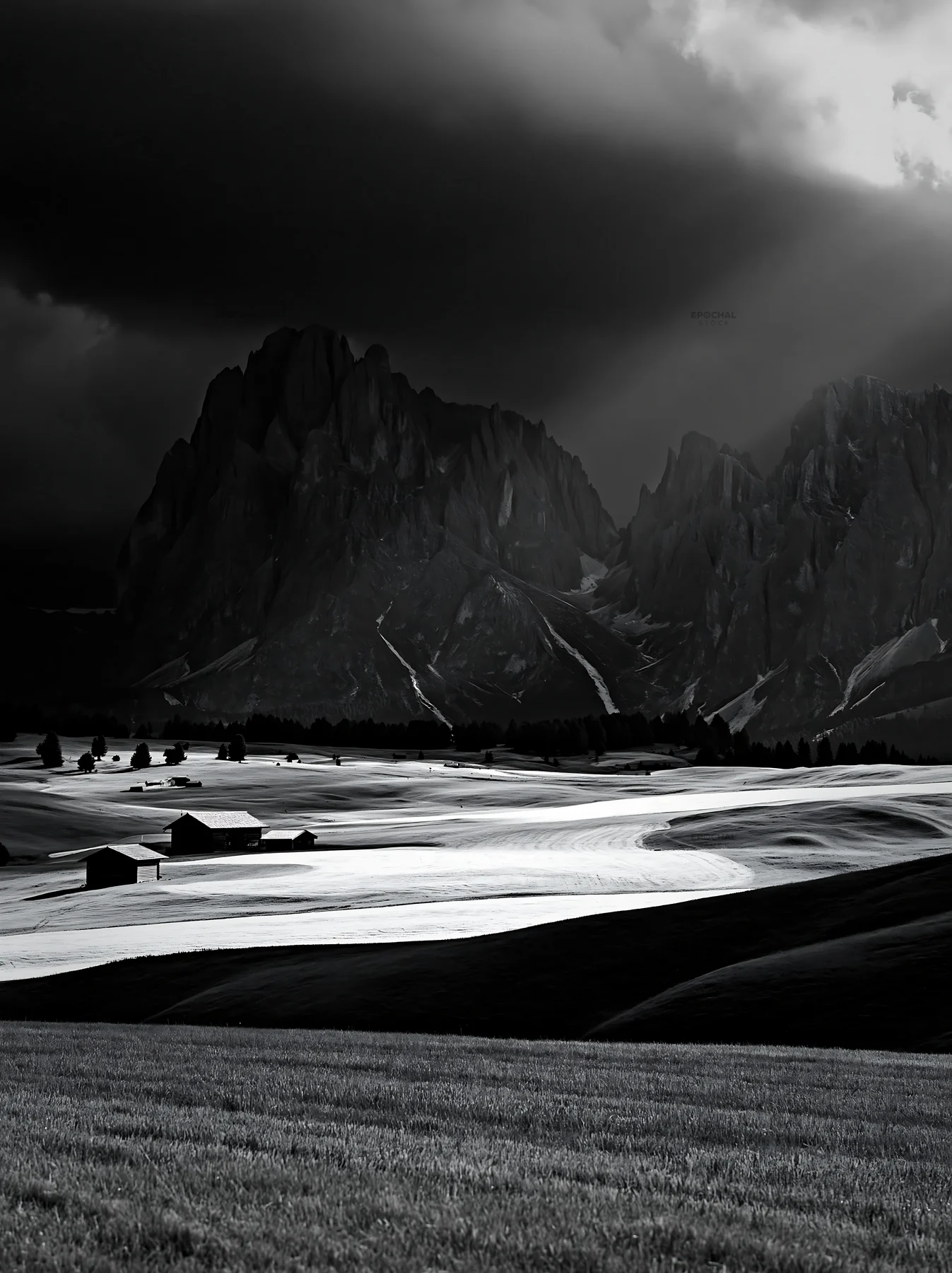 Black and white alpe di Siusi meadow sunbeams illuminate the landscape - AI-generated stock image