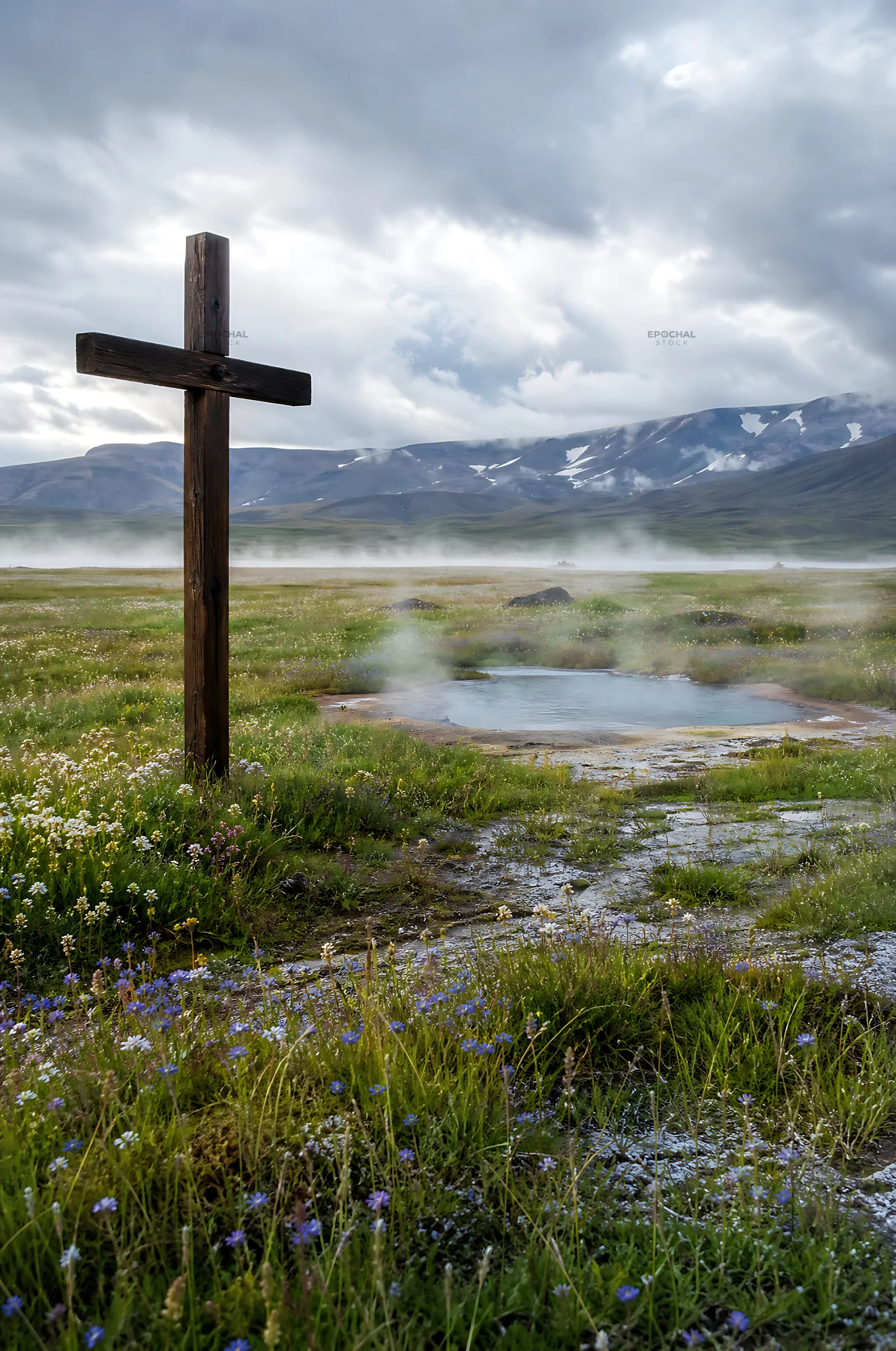 Wooden Christian cross by hot springs in meadow setting - AI-generated stock image
