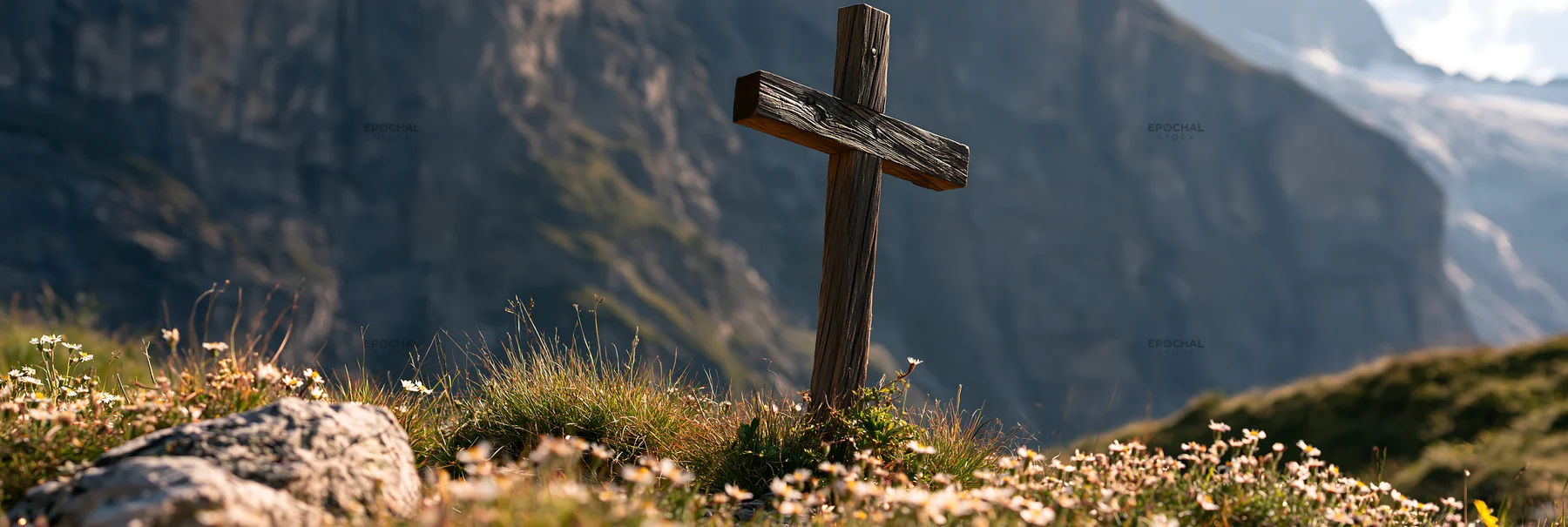 Wooden cross in mountain meadow with flowers - AI-generated stock image