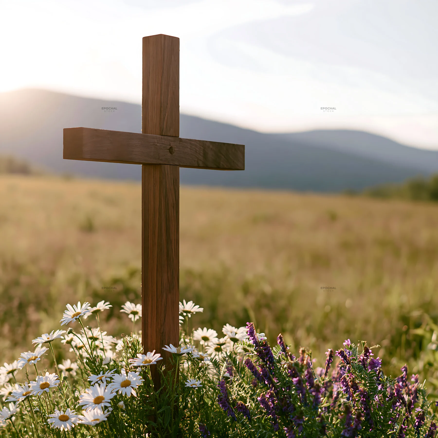 Christian cross in a summer meadow with flowers - AI-generated stock image