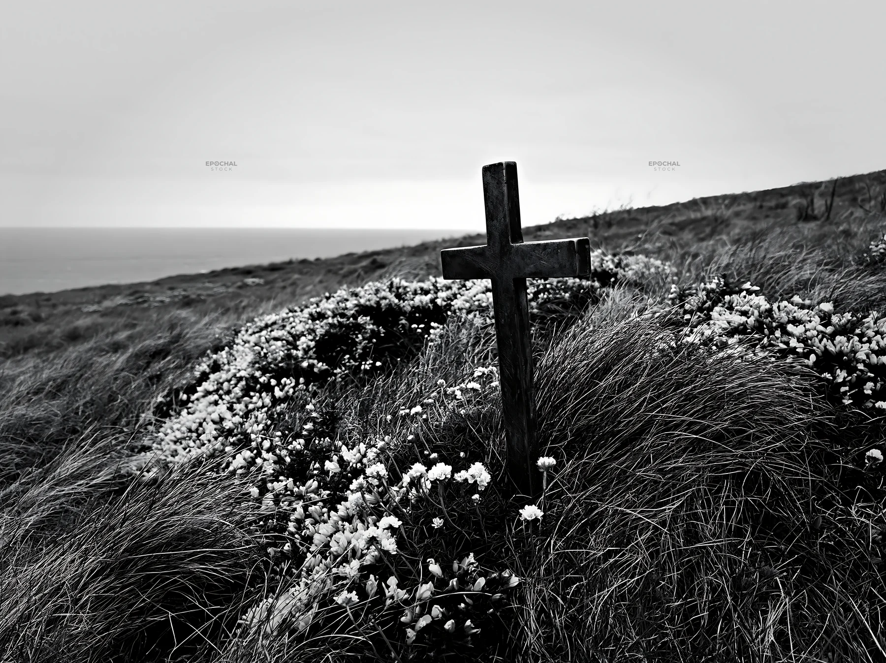 Christian cross in a Christmas meadow with flowers - AI-generated stock image