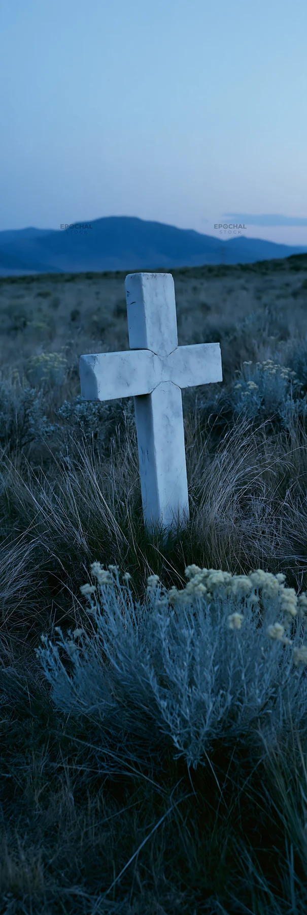White Christian cross in remote meadow at dusk - AI-generated stock image