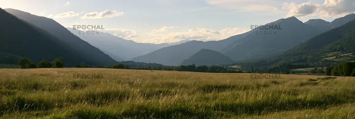 French meadow below Pyrenees range with mountains in the background - AI-generated stock image