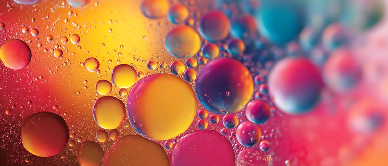 Colorful bubbles floating in liquid with bright background Free Premium Stock Image - stock photo