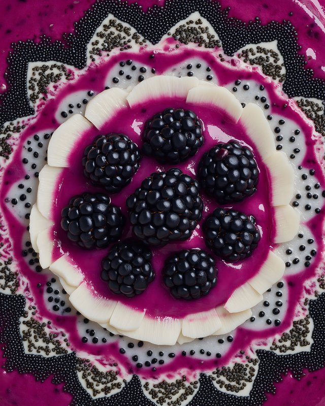 Fruit bowl with blackberries and banana slices on a plate Free Premium Stock Image - stock photo