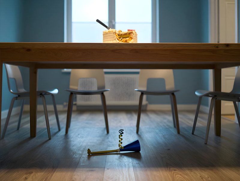 Celebration with cake and party horn on a wooden table Free Premium Stock Photo - stock photo