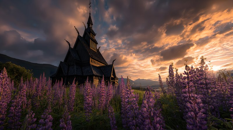 Sunset over old church with flowers in the foreground Free Premium Stock Image - stock photo