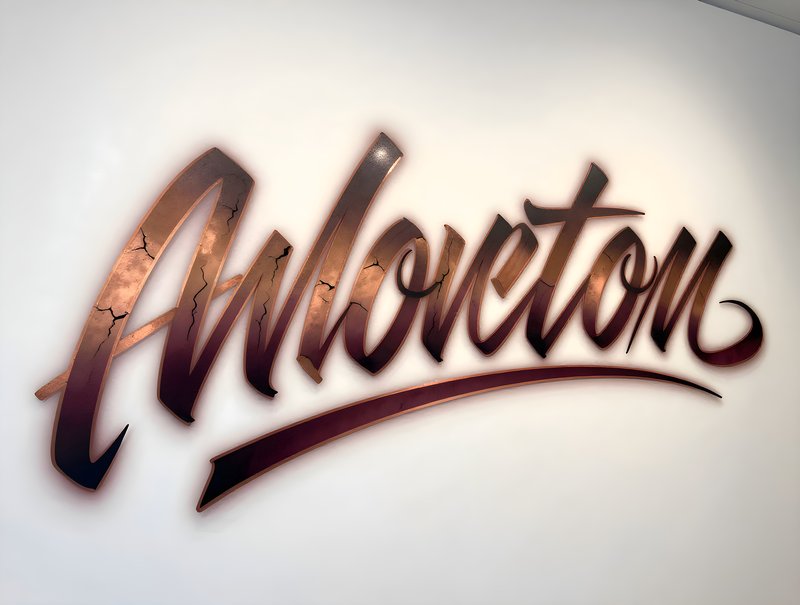 Wall art with word Mloveton on display in a modern space Premium Stock Image - stock photo