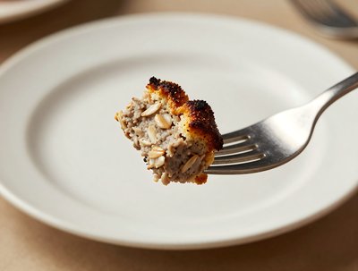 Goetta Slice on Fork, Crispy Golden Crust - stock photo