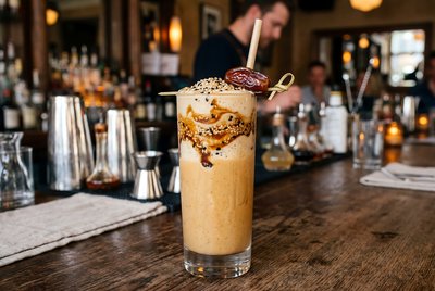 Tahini Date Shake Topped with Sesame Seeds - stock photo