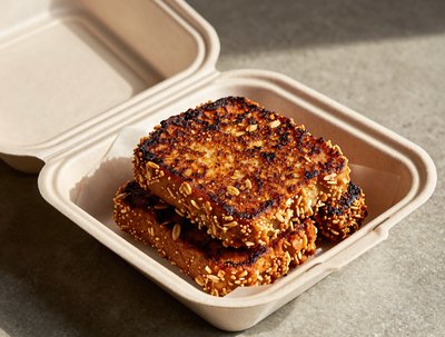 Crispy Goetta Patties with Sesame Seeds Box - stock photo