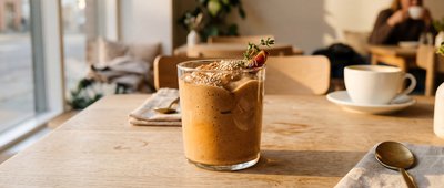 Creamy Tahini Date Shake at Modern Caf? - stock photo