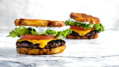 Jibarito Burger With Melted Cheese, Lettuce, and Tomato on Marble - stock photo