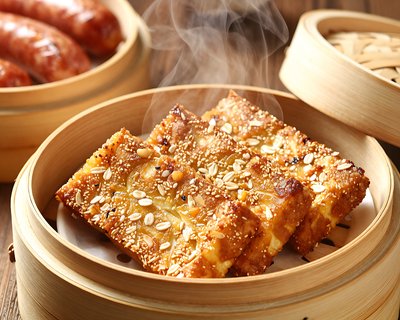 Goetta in Bamboo Steamer with Sesame - stock photo