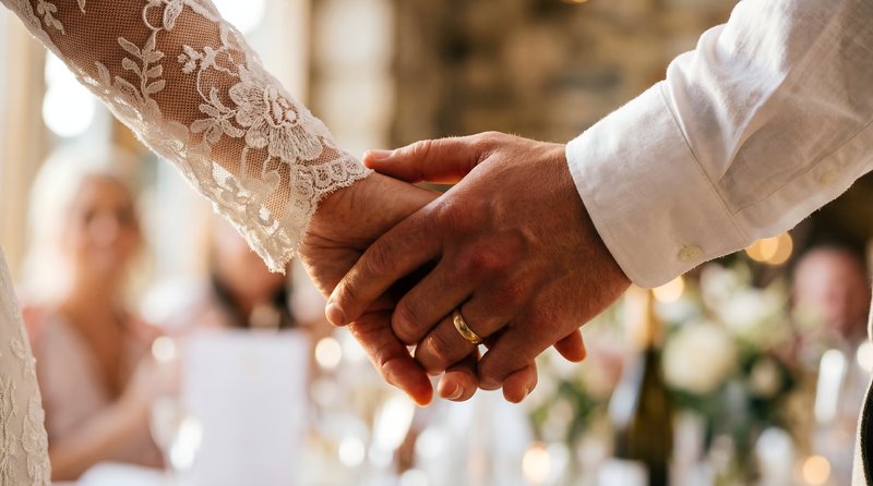Couple shares a moment during their wedding ceremony Premium Stock Photo - stock photo