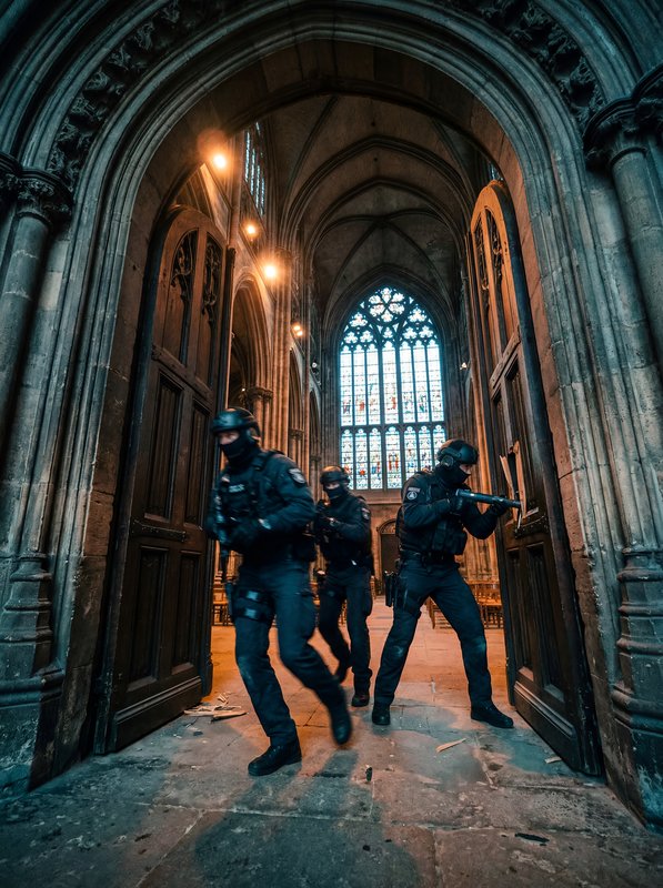 Police enter church during a security operation in the city Premium Stock Image - stock photo