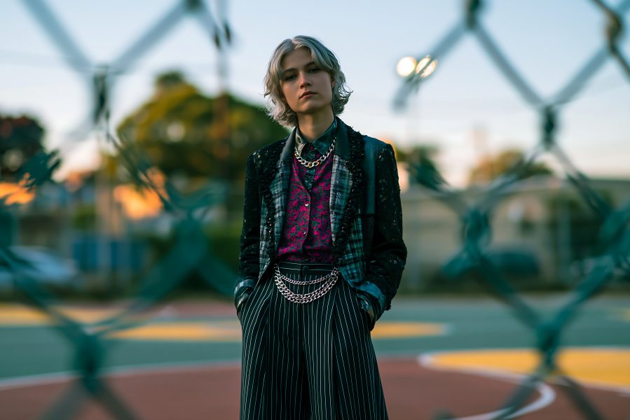 Androgynous Model on Basketball Court During Sunset