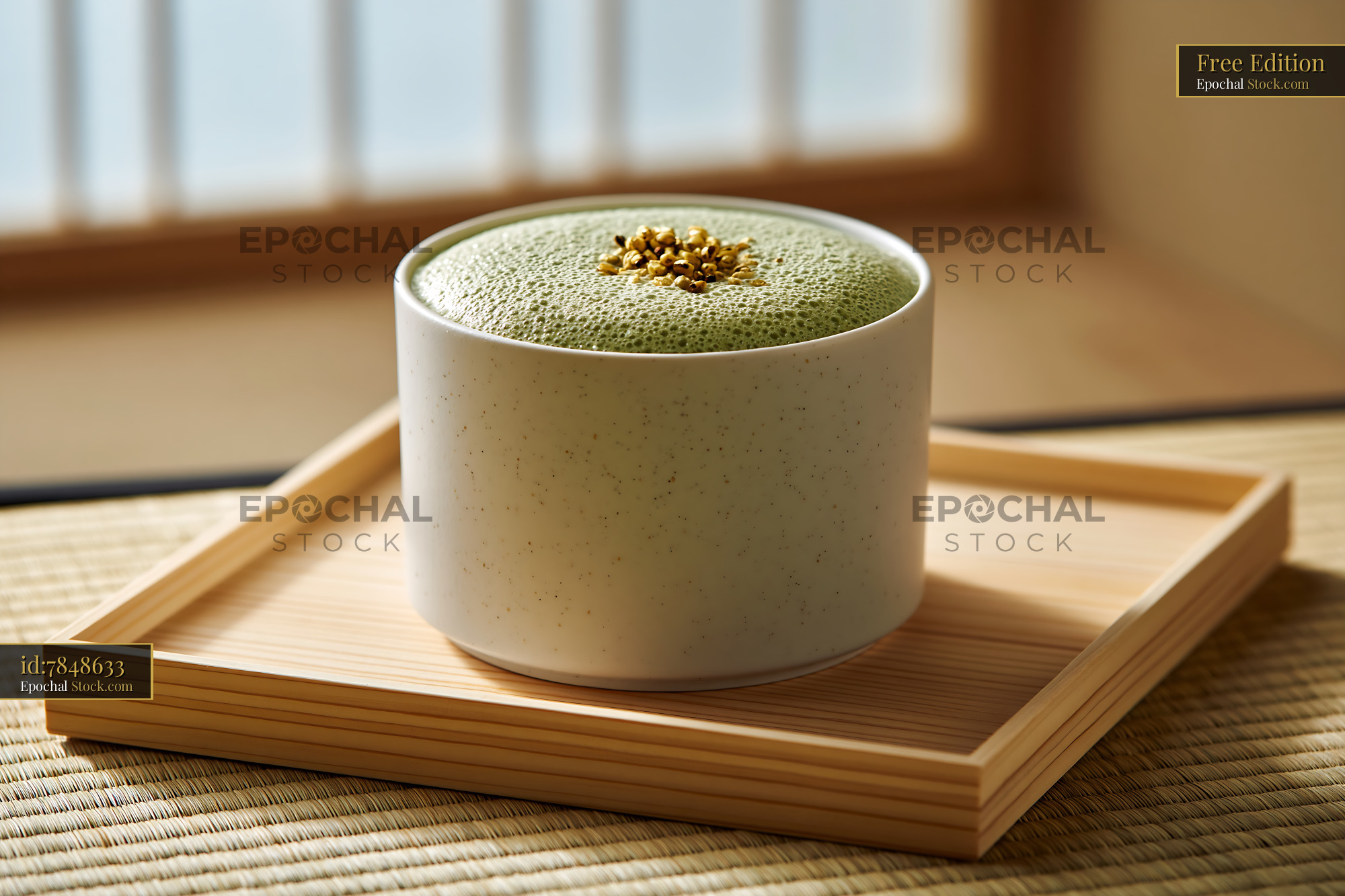 Genmaicha tea smoothie with roasted rice on a wooden tray - stock photo