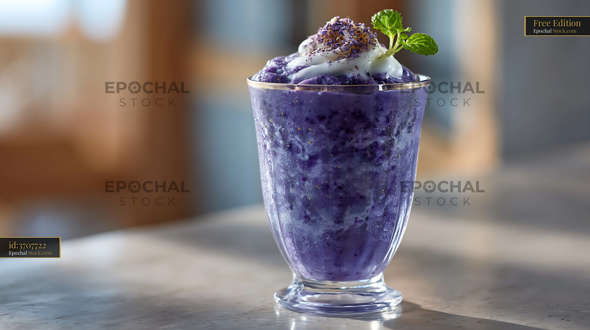 Purple beni imo smoothie with whipped cream and mint in a glass - stock photo