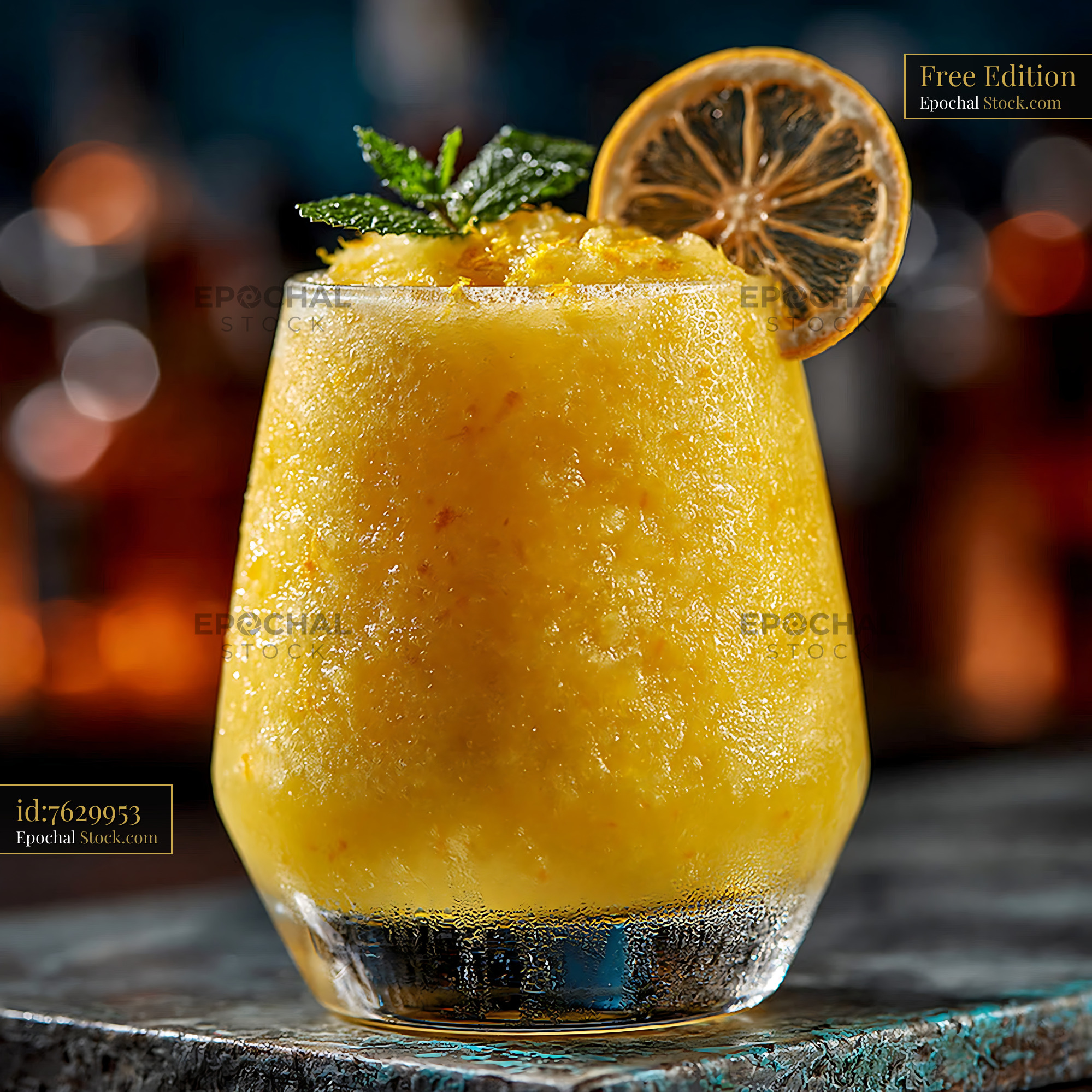 Yuja citron smoothie with mint and dried citrus in a glass - stock photo