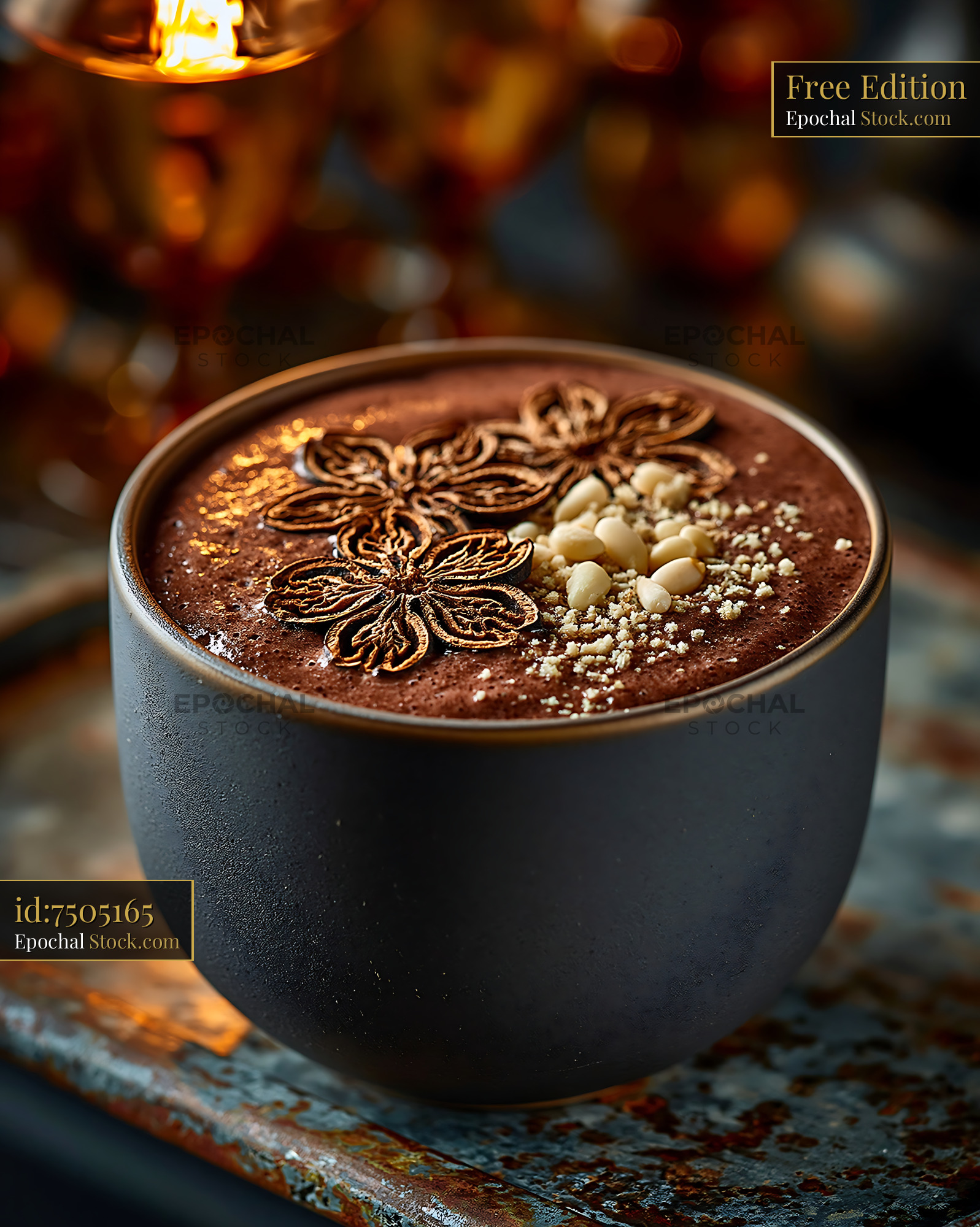 Healthy daechu jujube smoothie with pine nuts in a dark ceramic cup - stock photo