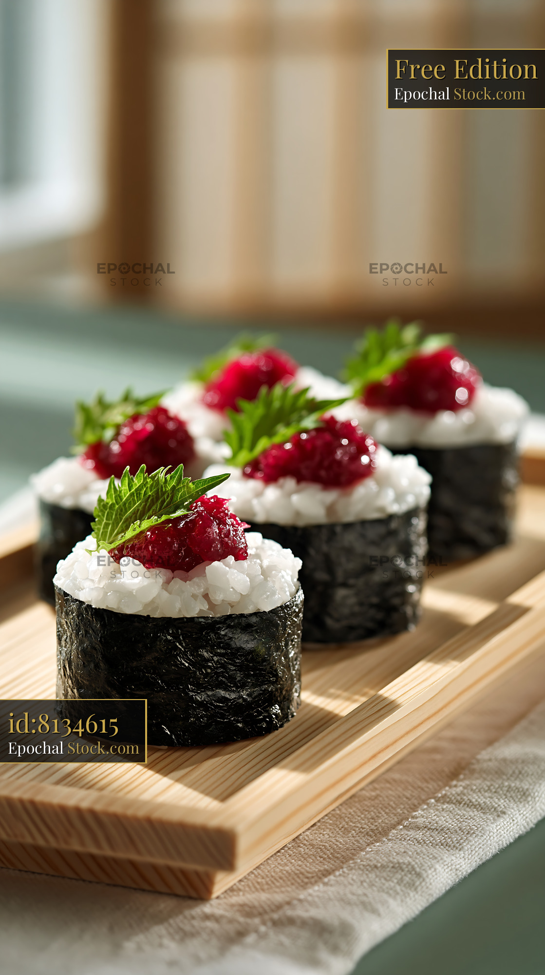 Fresh salted plum umeboshi sushi rolls on a wooden tray - stock photo