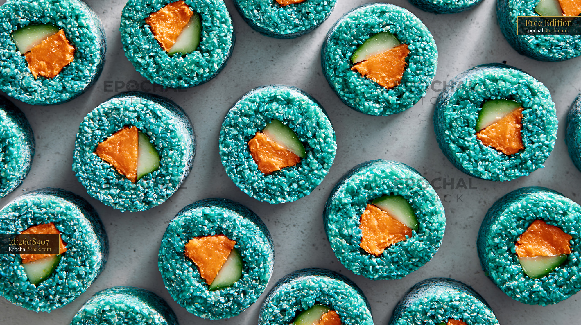 Creative vegan sushi rolls made with blue spirulina rice and vegetable - stock photo