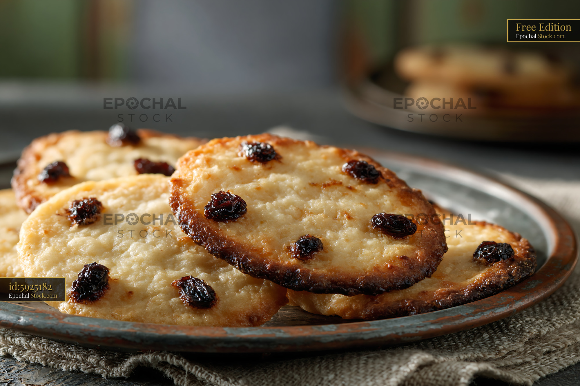 Fresh shirini kishmishi biscuits on a rustic metal plate - stock photo