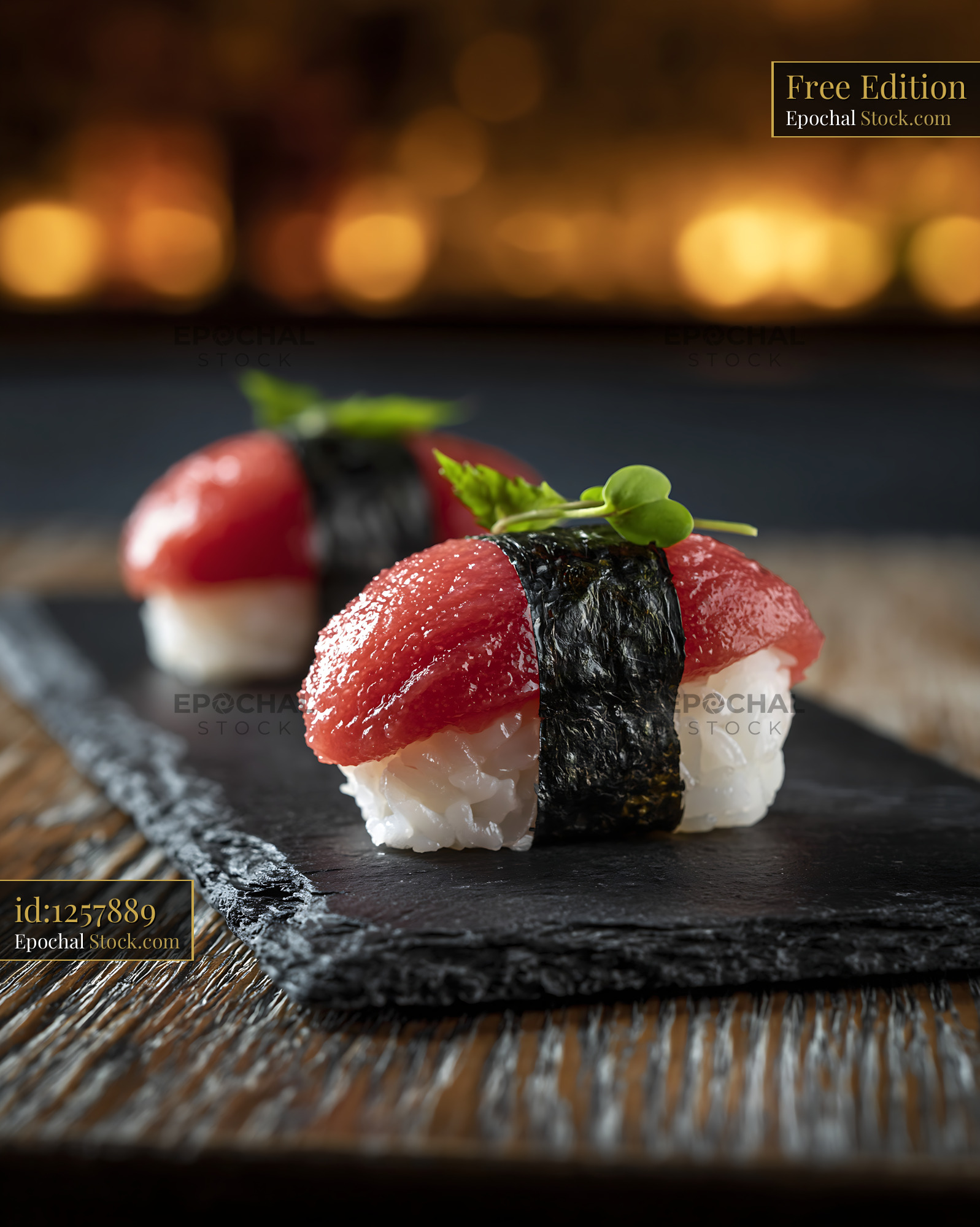 Salted plum umeboshi sushi nigiri on a black slate board - stock photo