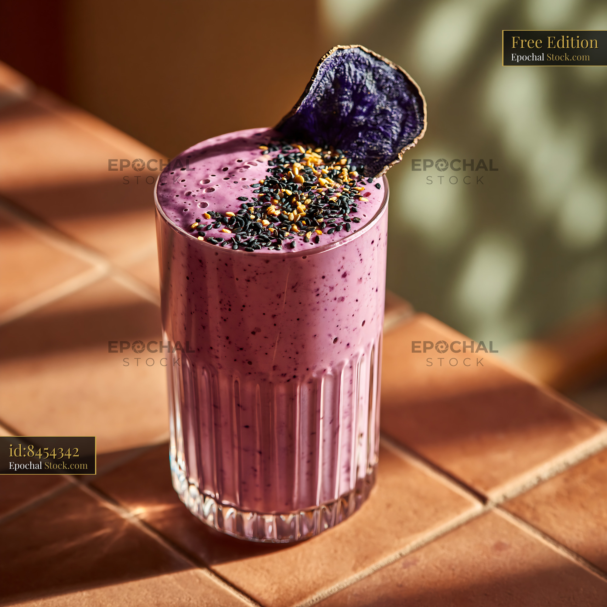 Purple sujeonggwa smoothie with sweet potato chip on warm terracotta t - stock photo