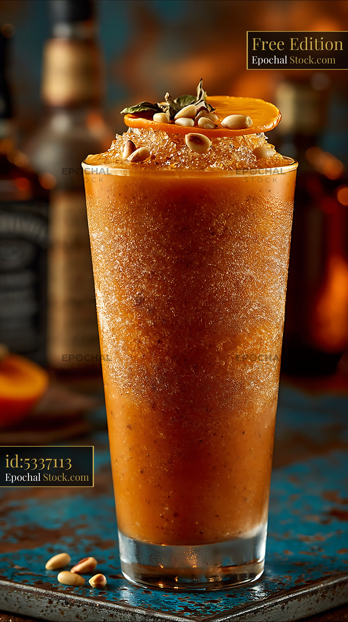 Frozen sujeonggwa smoothie garnished with pine nuts and persimmon - stock photo