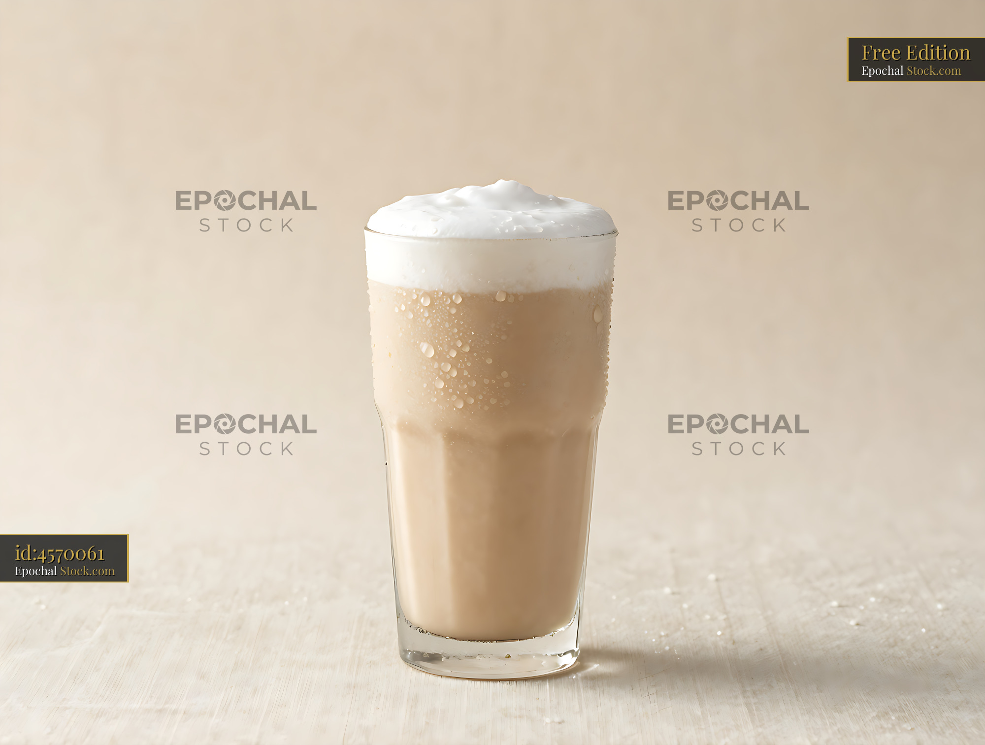 Cupuacu cream smoothie with thick foam in a tall chilled glass - stock photo
