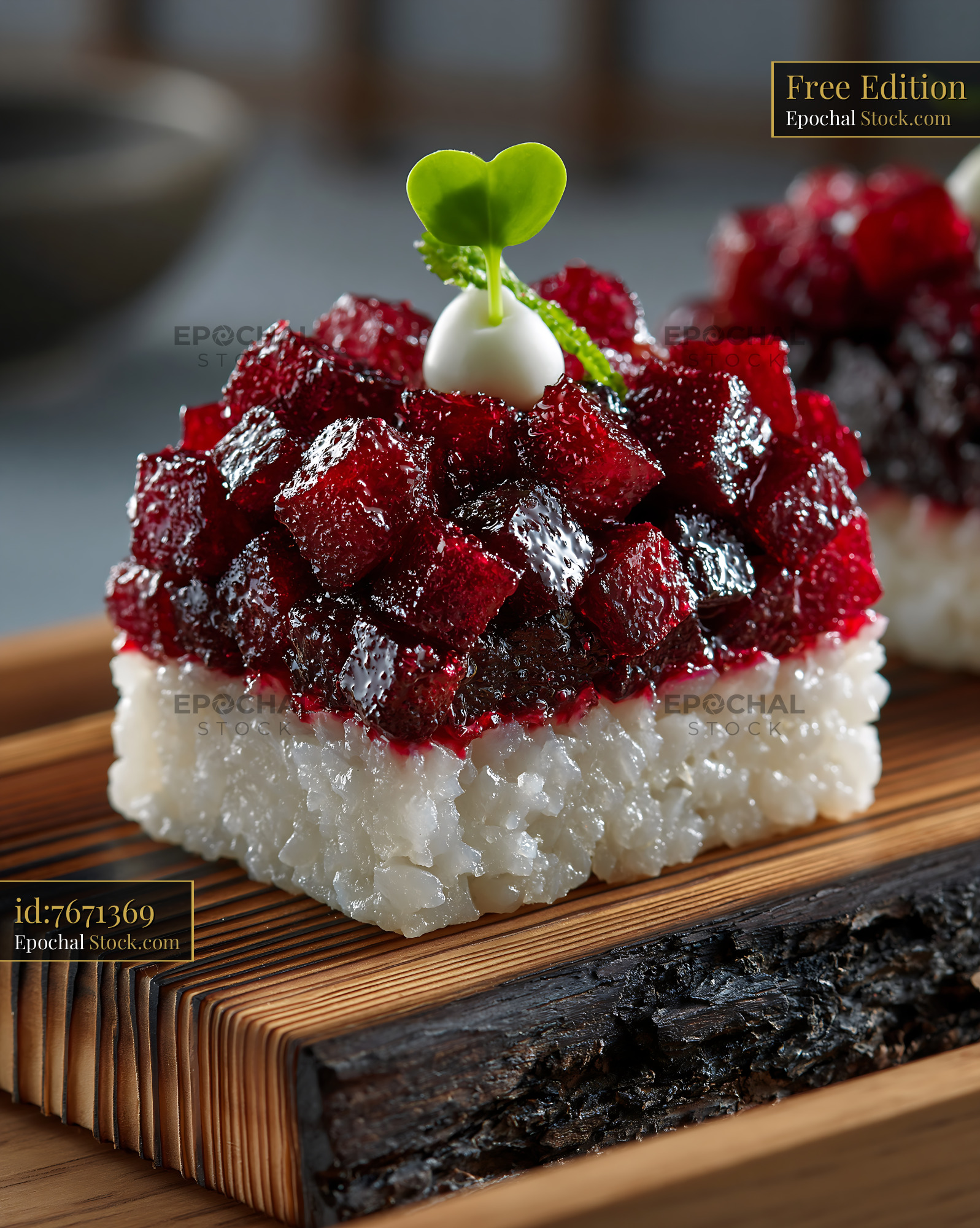 Vegan beet tartare sushi served on a rustic charred wooden board - stock photo