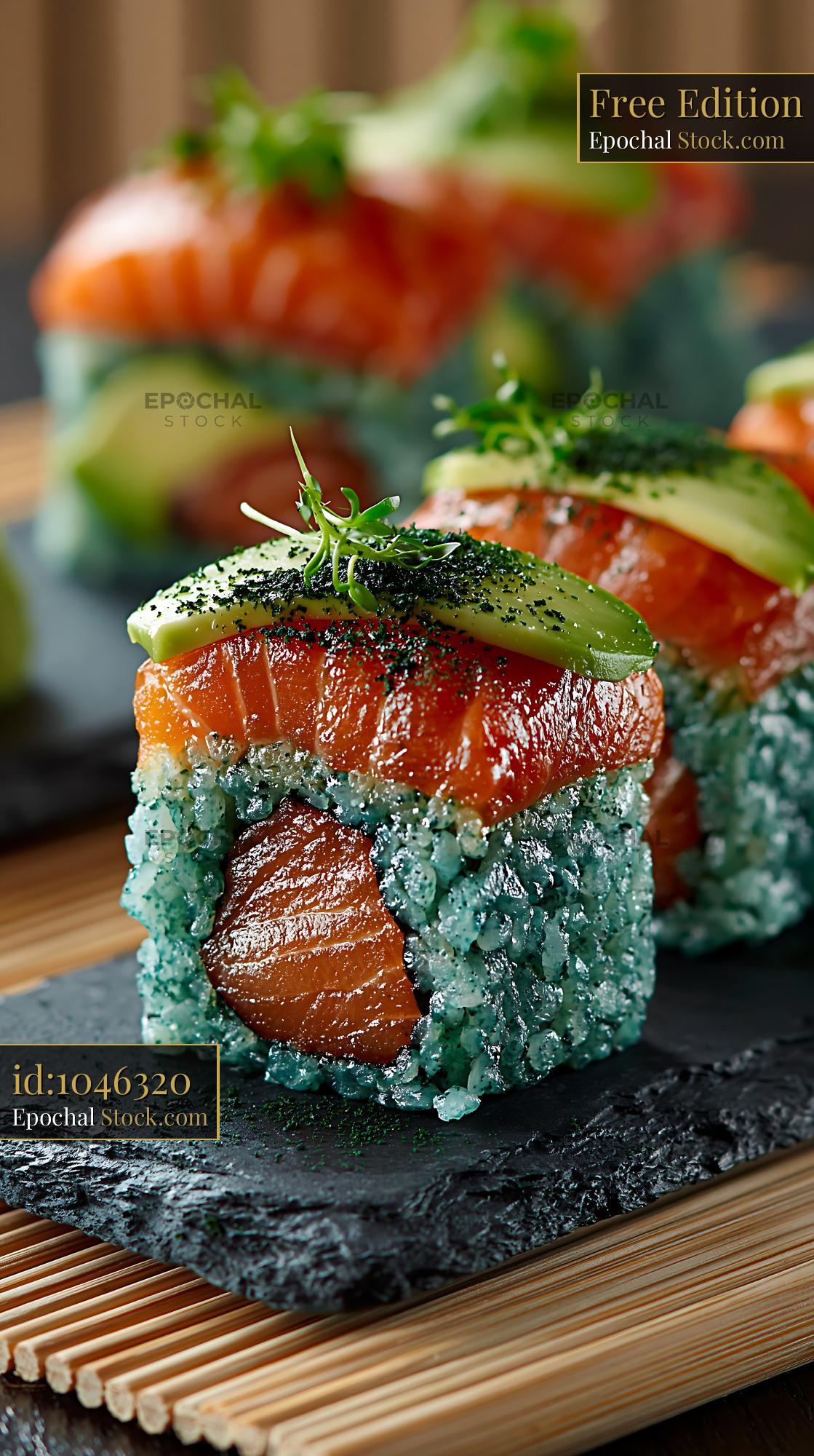 Gourmet sushi rolls with blue spirulina rice and fresh salmon - stock photo