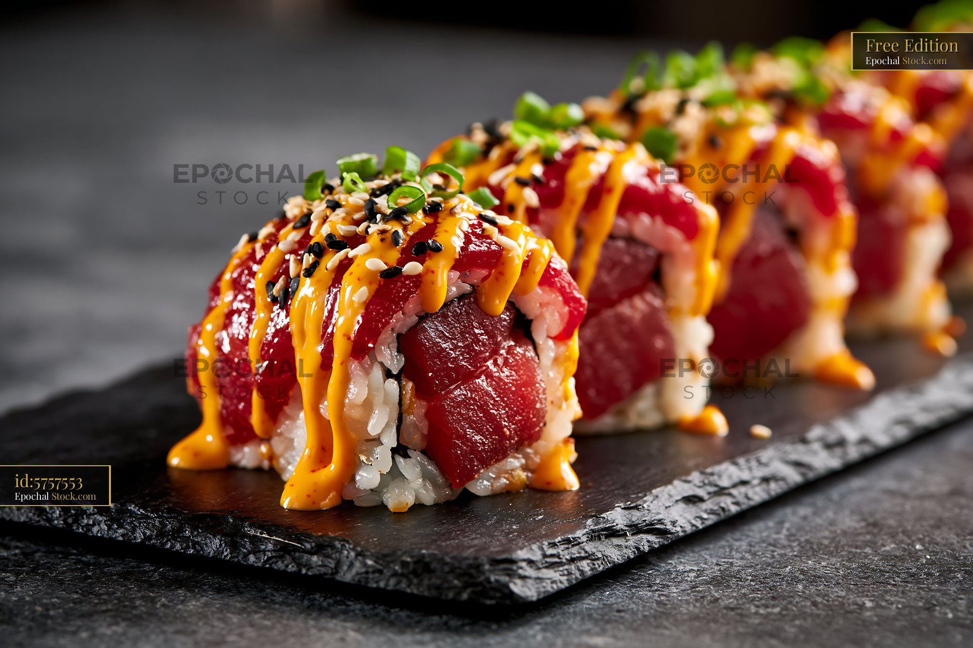 Spicy tuna sushi rolls with sriracha mayo and sesame seeds - stock photo