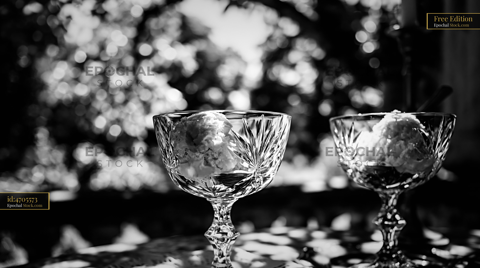 Amaretto liqueur ice cream in elegant crystal bowls - stock photo
