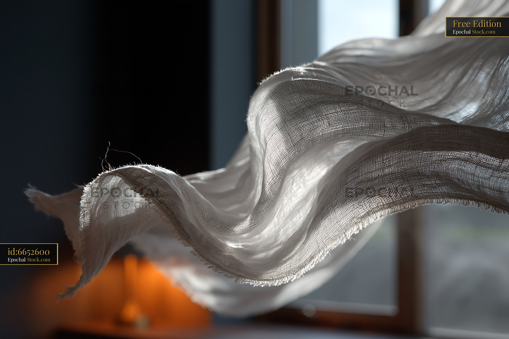 White linen curtains blowing in the breeze at an open window - stock photo