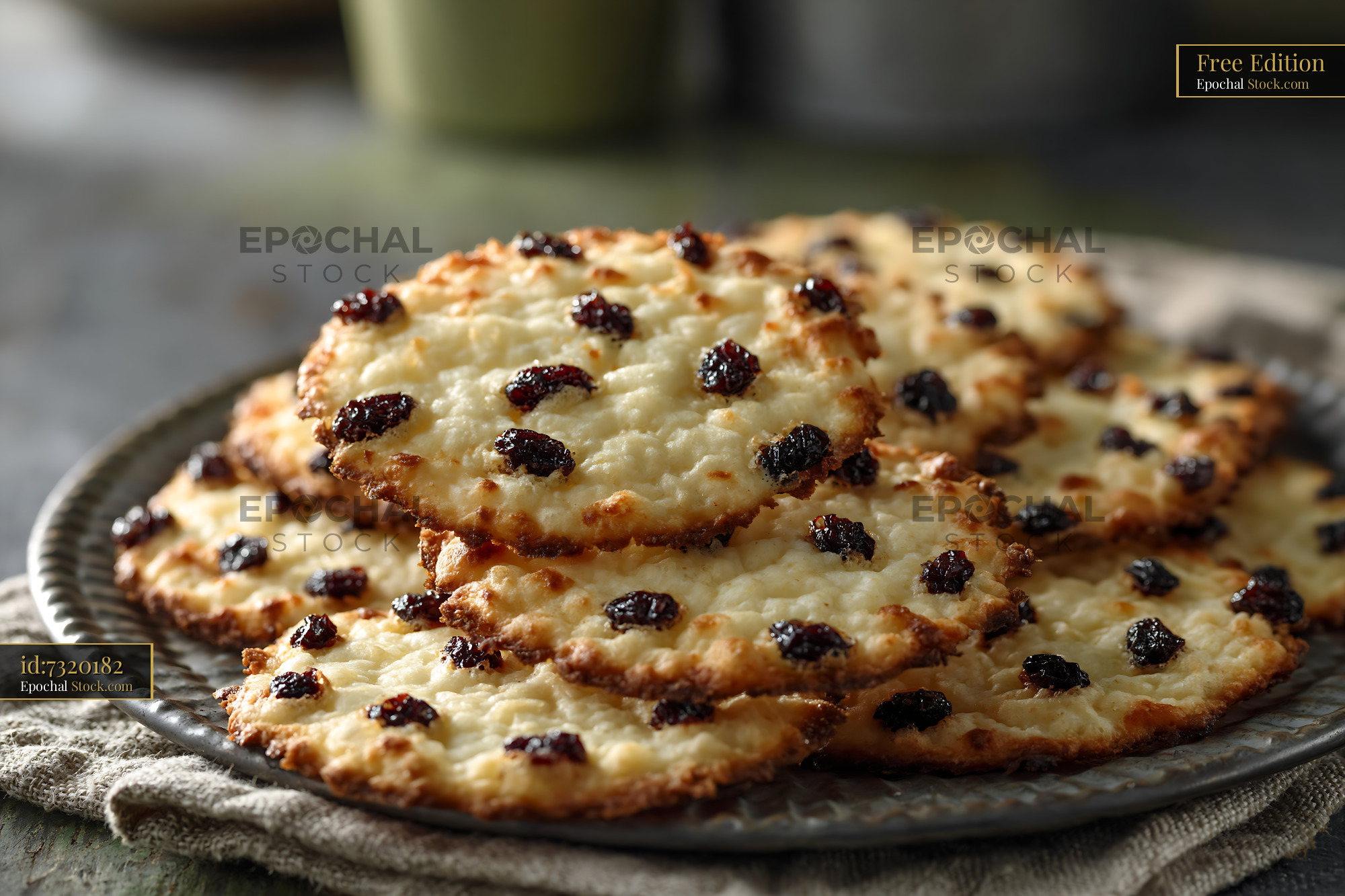 Shirini kishmishi biscuits stacked on a rustic plate - stock photo