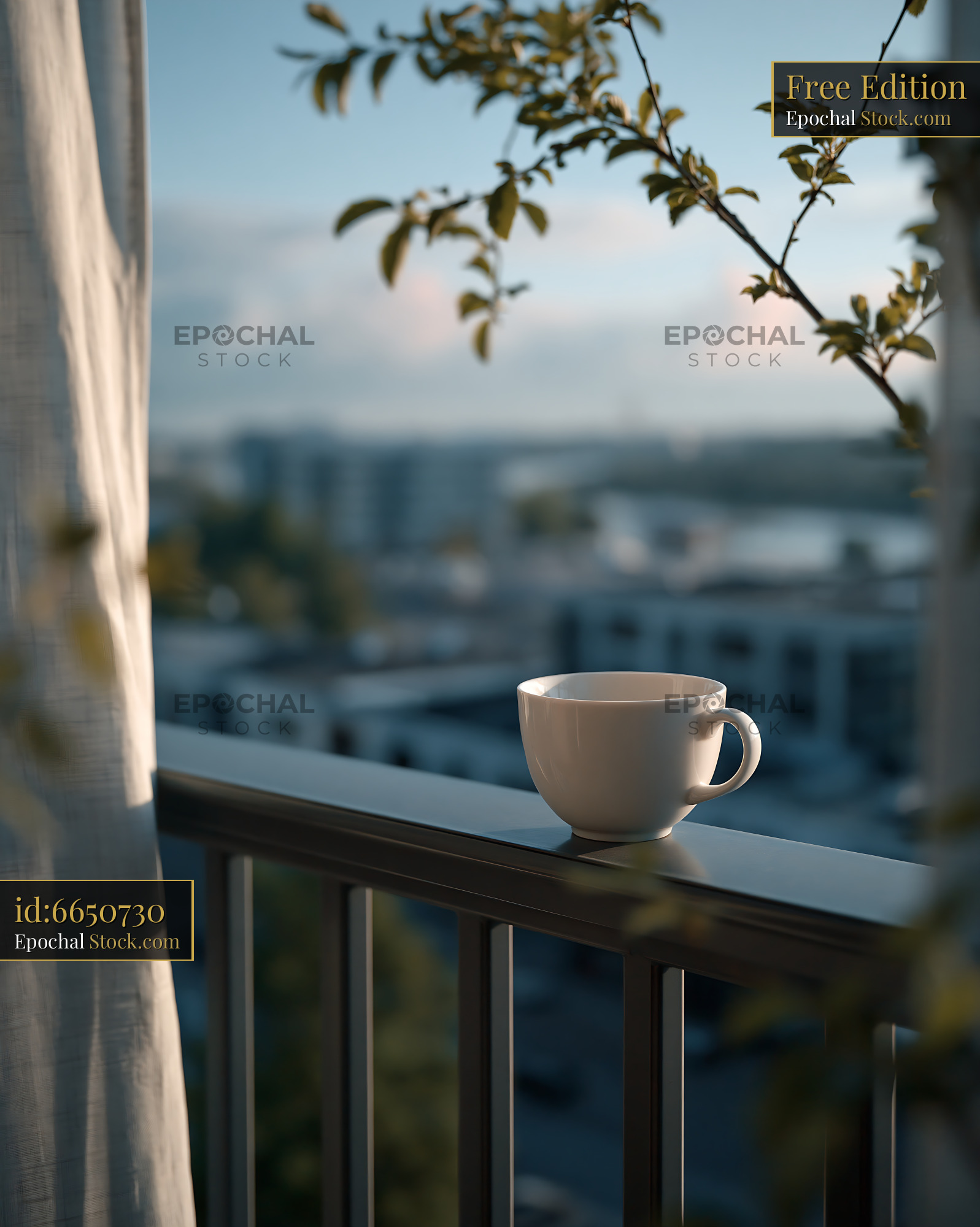 White coffee cup on city balcony railing during golden hour - stock photo