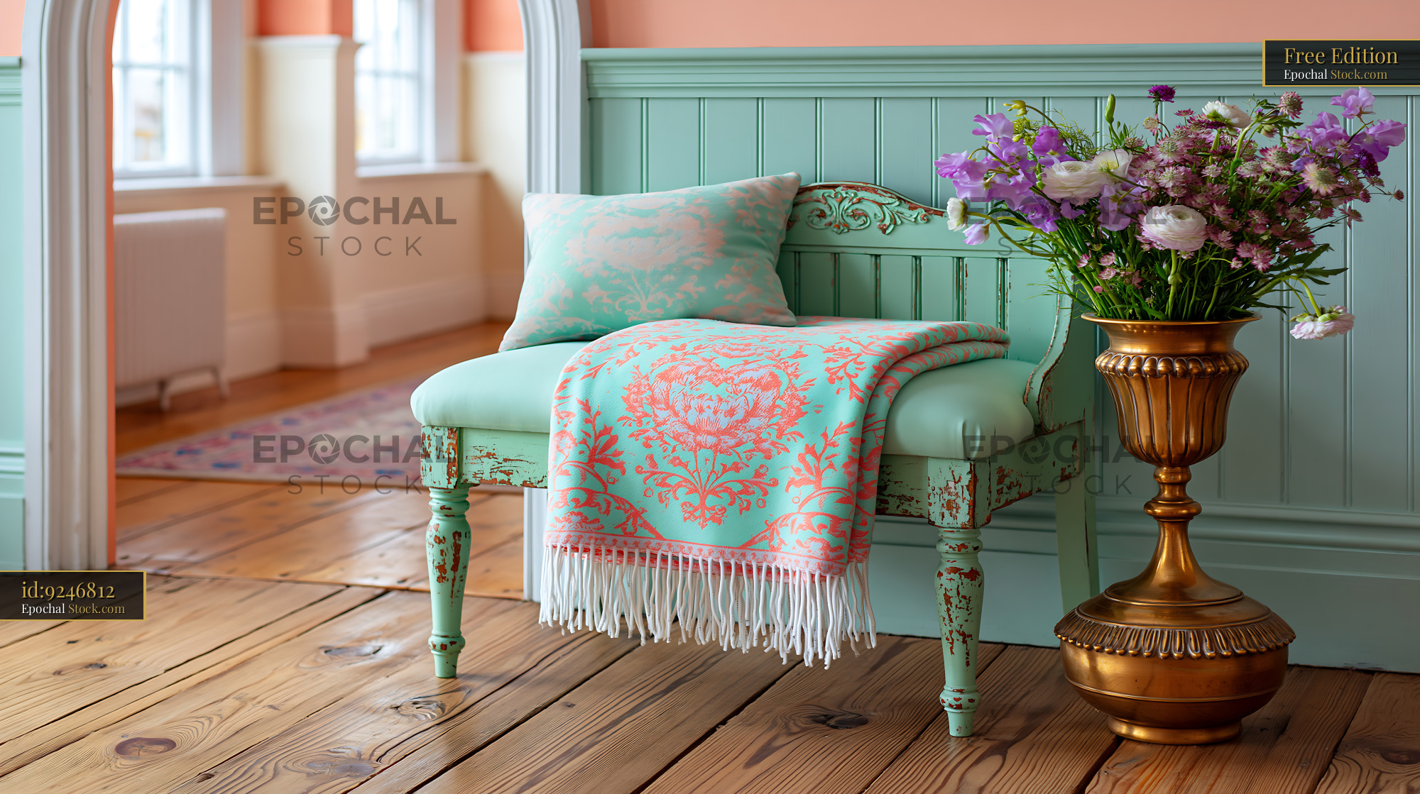 Shabby chic bench with mint green blanket and floral arrangement - stock photo