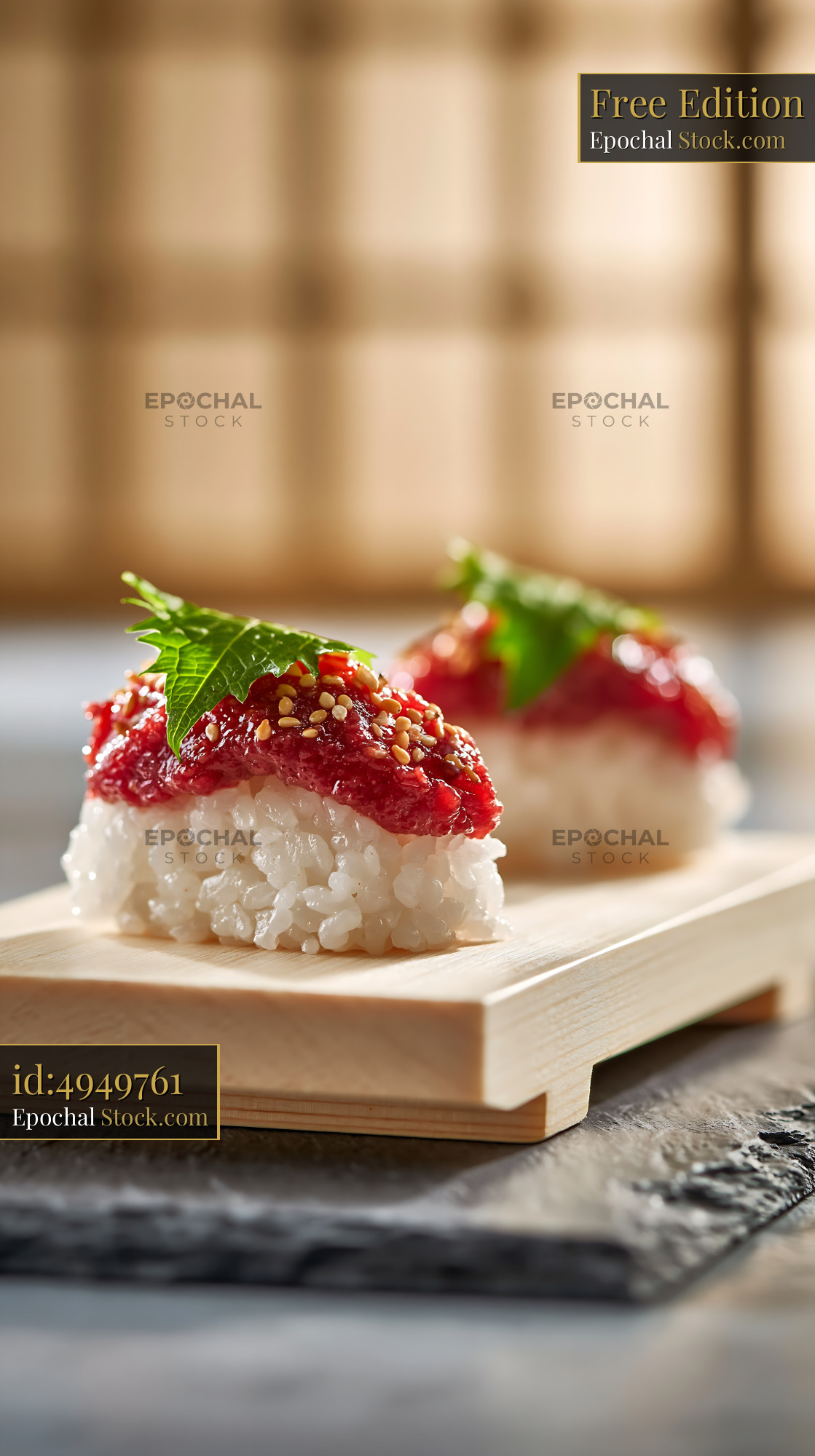 Salted plum umeboshi sushi with shiso leaf on a wooden tray - stock photo