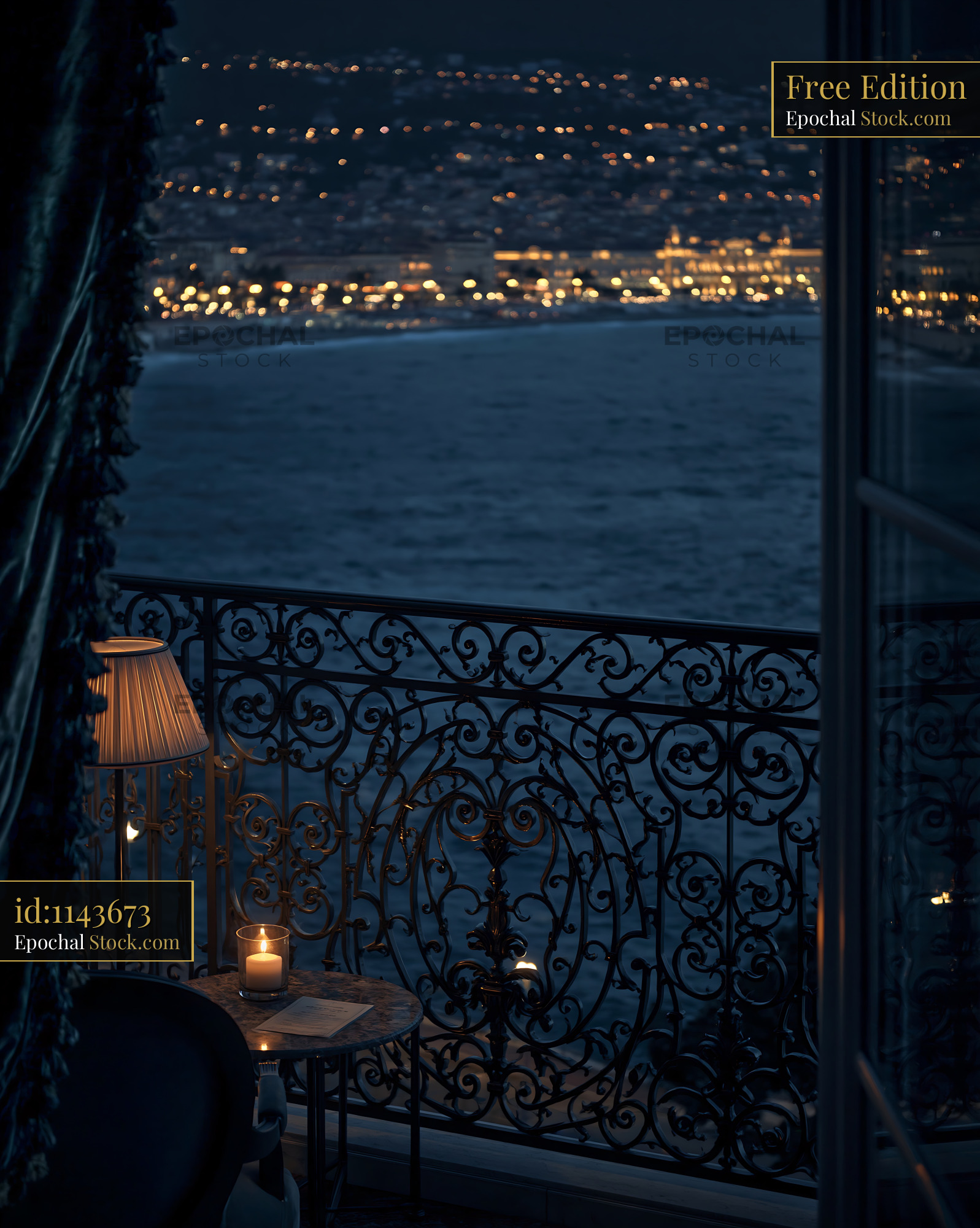 Luxury hotel balcony with candle light overlooking city at night - stock photo