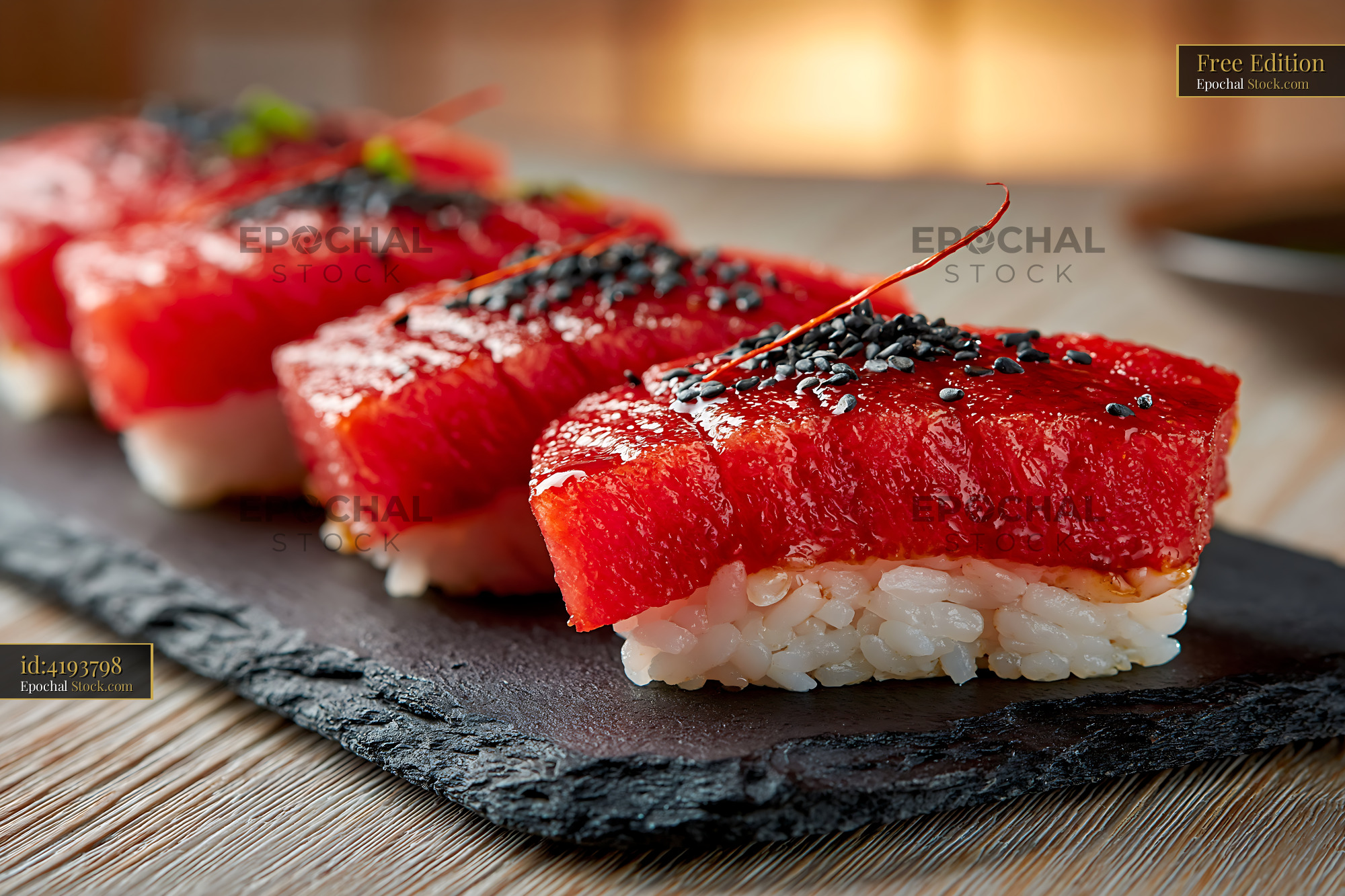 Vegan watermelon tuna sushi nigiri served on a black slate board - stock photo