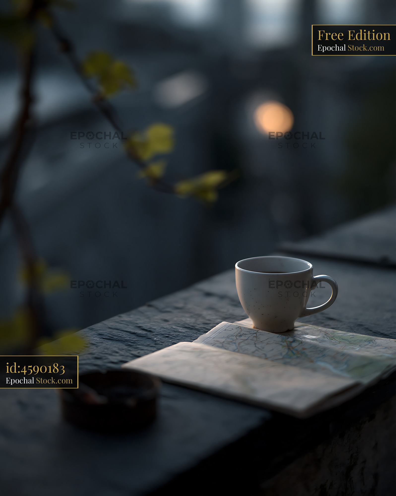 Coffee cup on a map at a city balcony during blue hour