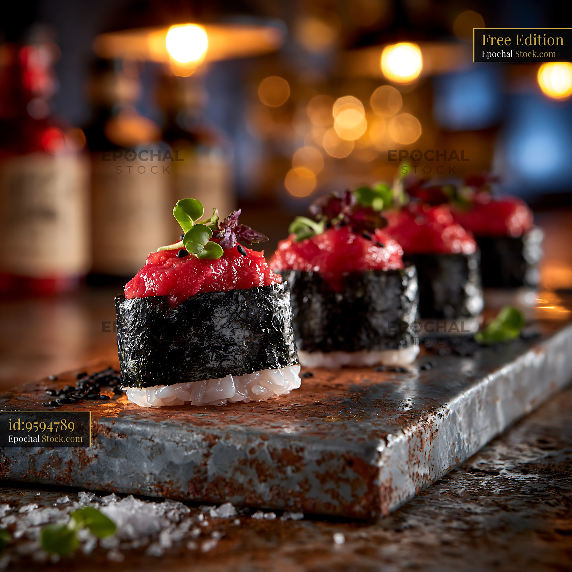 Salted plum umeboshi sushi gunkan served on a rustic stone platter - stock photo