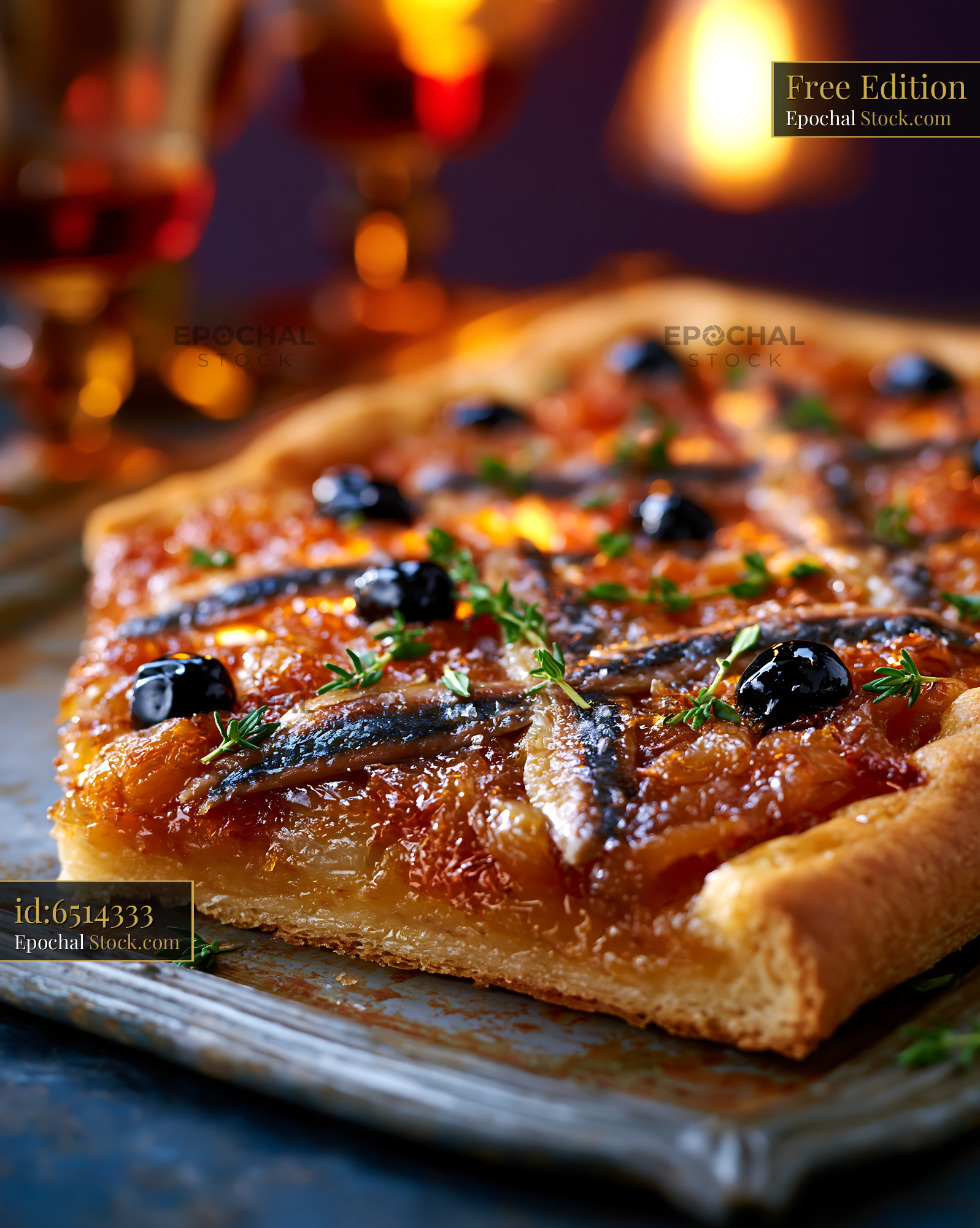 French pissaladiere pizza with caramelized onions olives and anchovies - stock photo