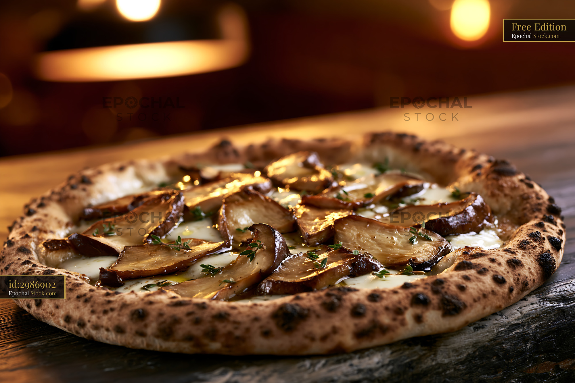 Gourmet porcini mushroom pizza with fresh herbs on rustic wood - stock photo