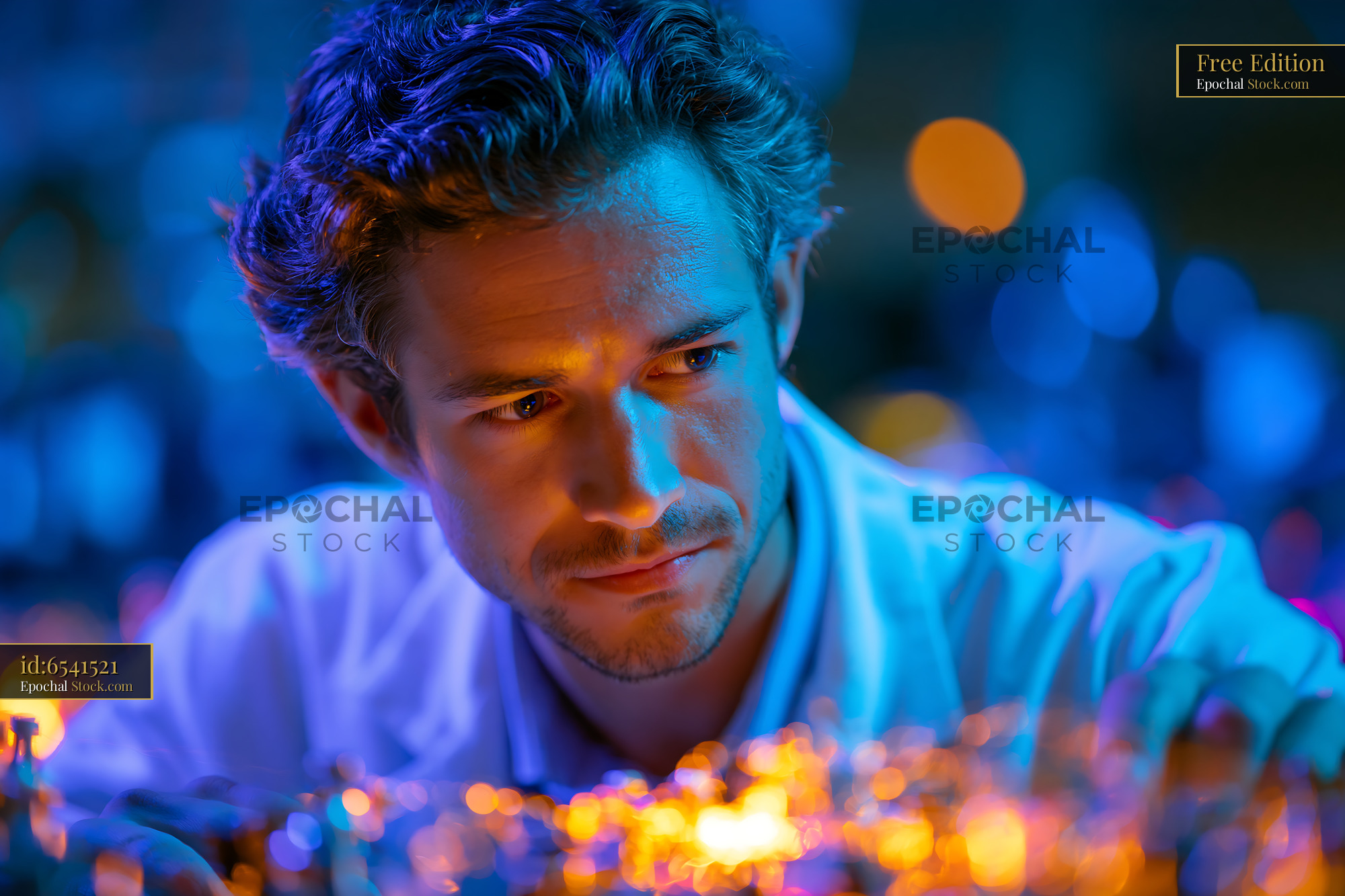 Male scientist working with hollow core photonic crystal fiber raman - stock photo