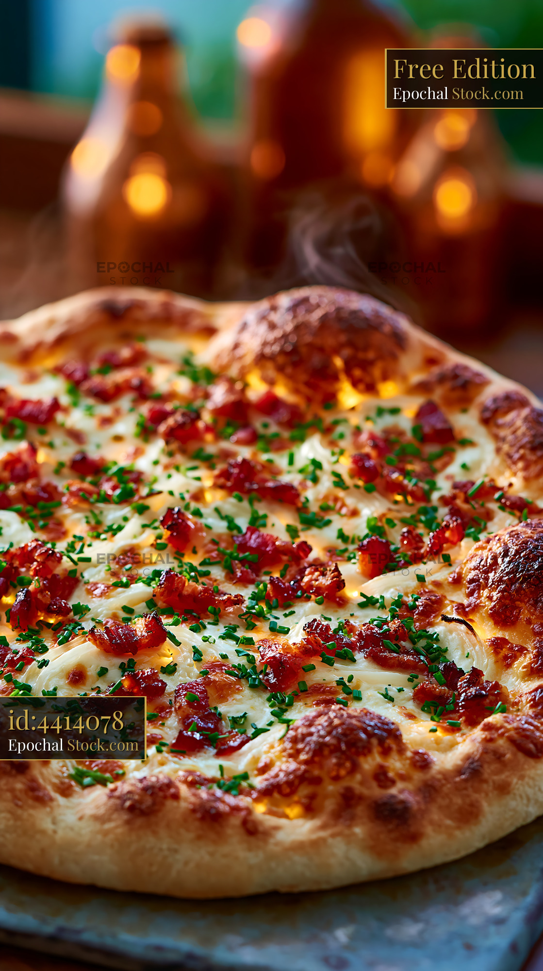 Freshly baked tarte flambee pizza with crispy bacon and chives - stock photo