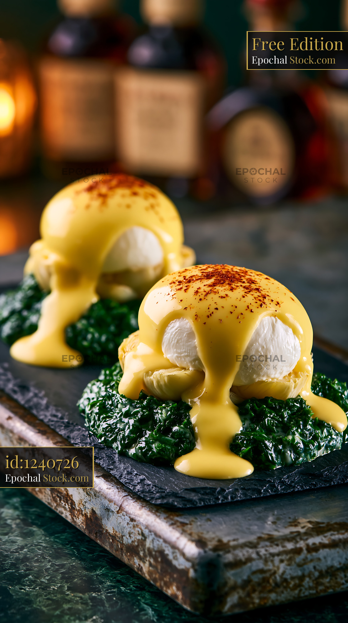 Gourmet eggs sardou with poached eggs and hollandaise sauce - stock photo